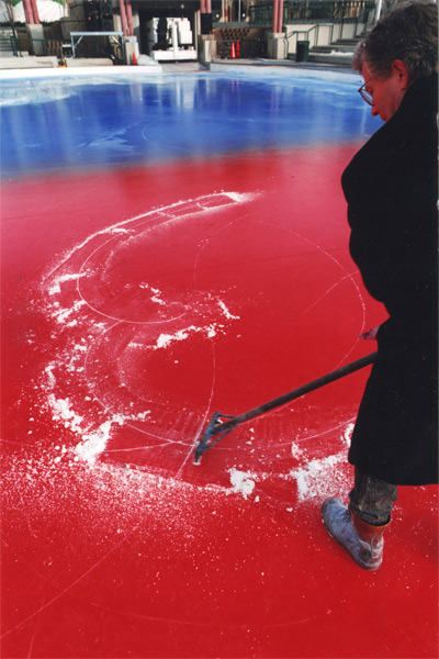 Halloran, scraping the ice 